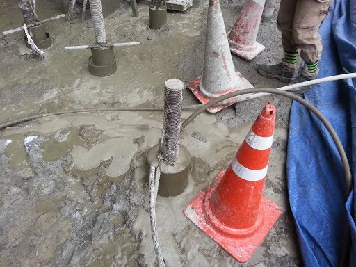 SH 200 non-shrink grouting mortar being poured